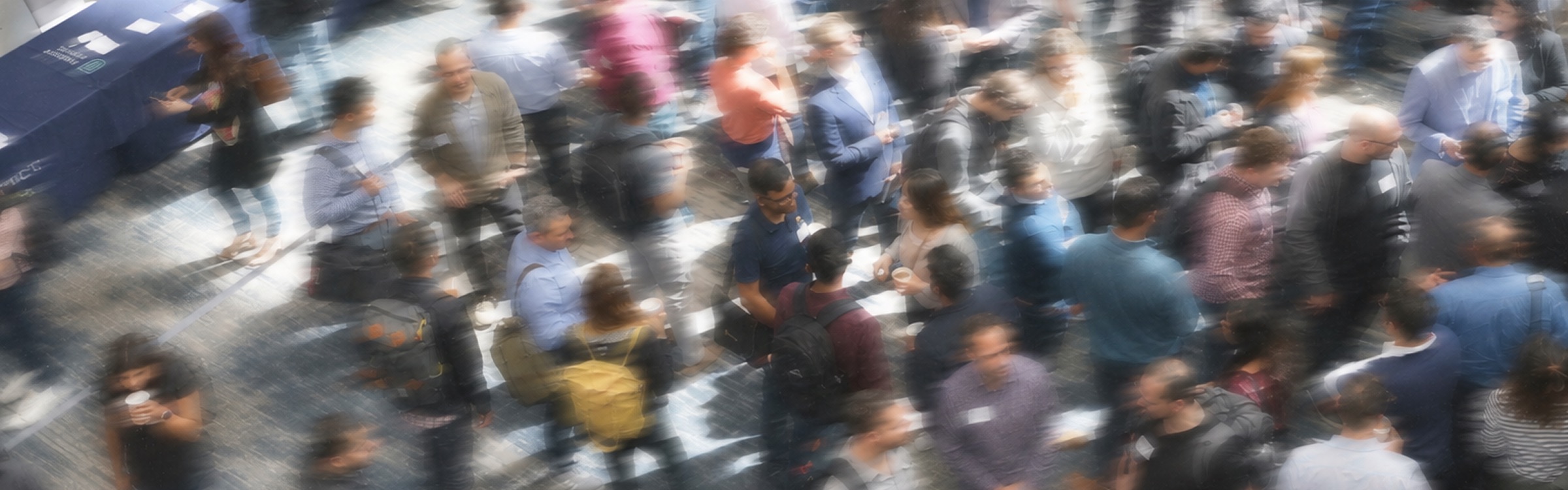 A crowd gathered at an indoor event
